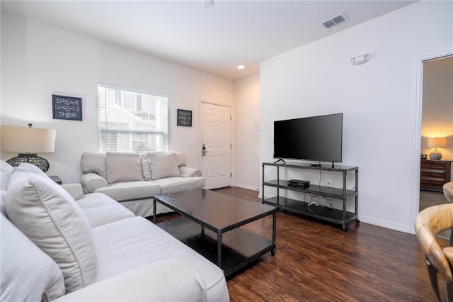 living room featuring dark hardwood / wood-style floors