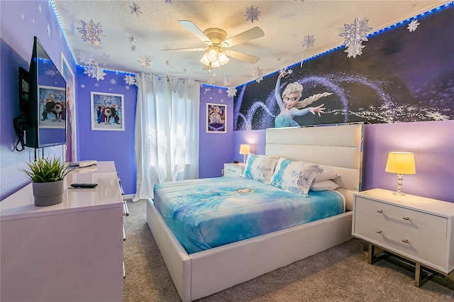 bedroom featuring carpet, ceiling fan, and a textured ceiling