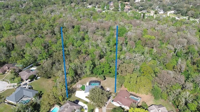 bird's eye view featuring a view of trees