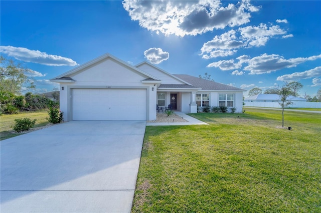 ranch-style home featuring a garage and a front lawn