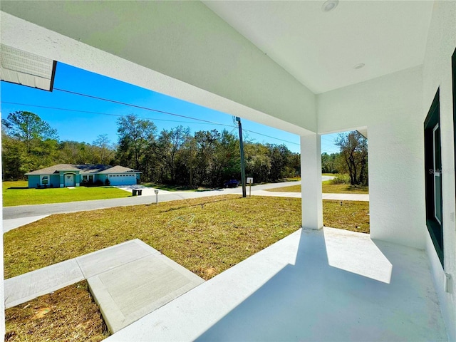 view of yard with a patio area