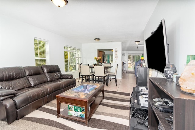 living room featuring light tile patterned flooring