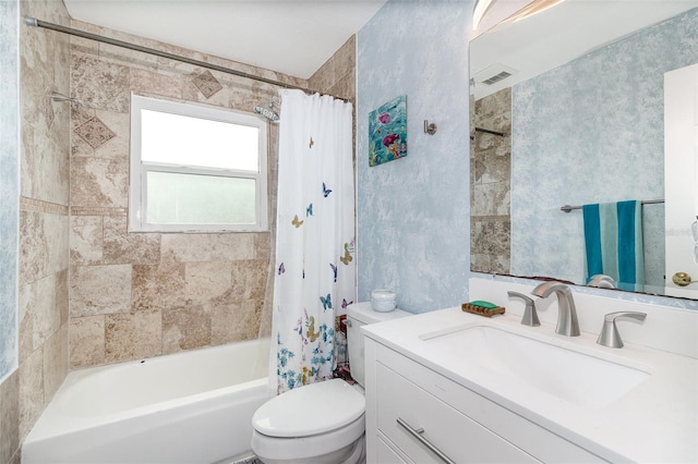 bathroom featuring shower / bath combination with curtain, visible vents, vanity, and toilet