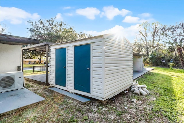 view of shed featuring ac unit