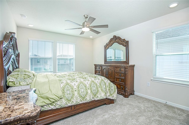 bedroom featuring ceiling fan, baseboards, carpet flooring, and recessed lighting