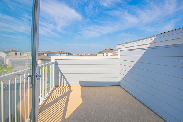 balcony featuring a residential view