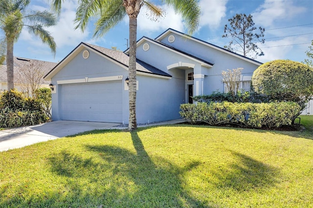 ranch-style home with driveway, a front lawn, an attached garage, and stucco siding