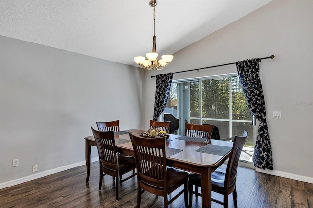 dining room with a notable chandelier, baseboards, vaulted ceiling, and wood finished floors