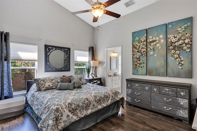 bedroom featuring ceiling fan, high vaulted ceiling, ensuite bathroom, dark wood-type flooring, and visible vents