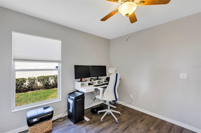 office area featuring ceiling fan, baseboards, and wood finished floors