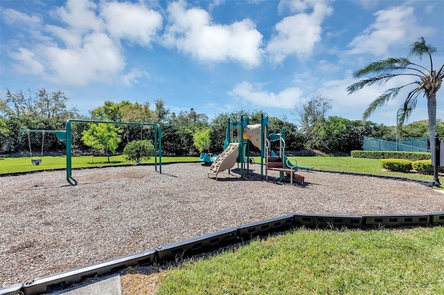 communal playground with a lawn