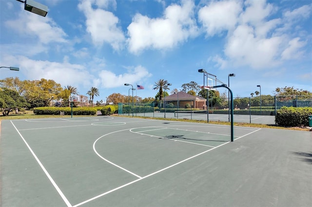 view of sport court with community basketball court and fence