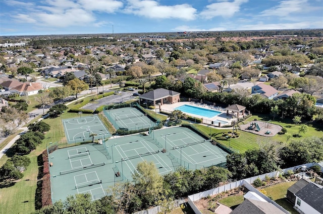 birds eye view of property with a residential view