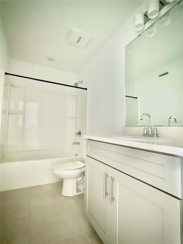 full bath featuring  shower combination, vanity, toilet, and tile patterned floors