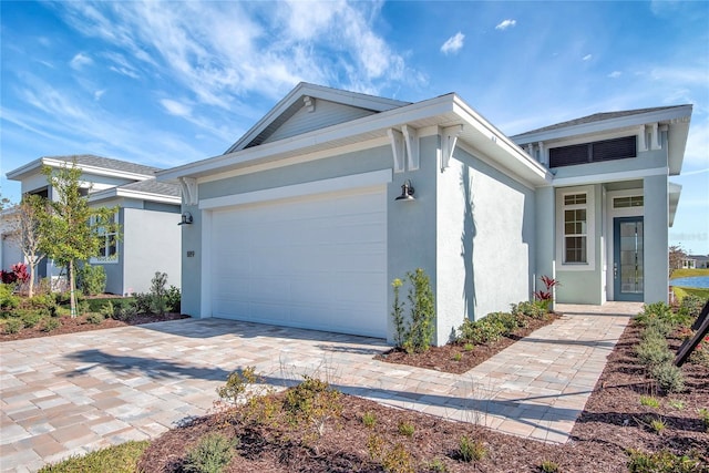 view of front of property featuring a garage