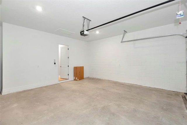 garage featuring a garage door opener