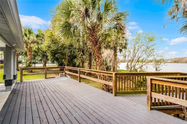 wooden deck with a water view