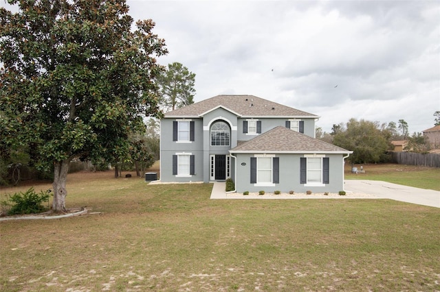 view of front of home with a front lawn