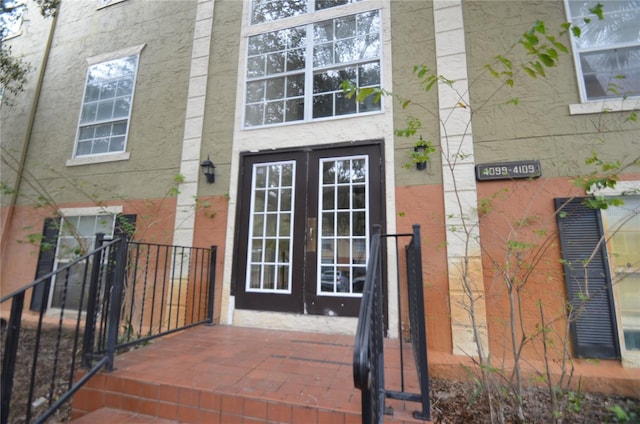 doorway to property featuring french doors