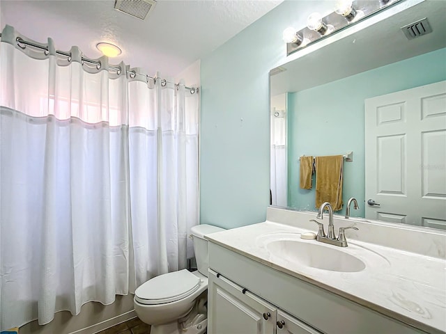 full bathroom featuring vanity, toilet, and shower / bath combo