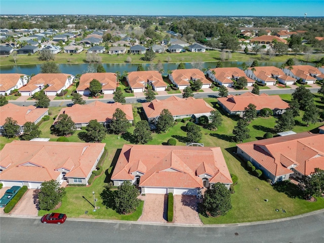 drone / aerial view with a water view