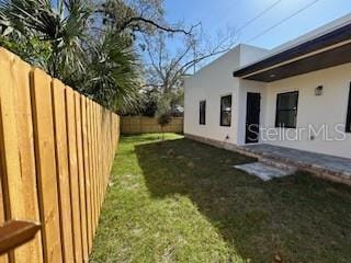 2604 E 11th Ave, Tampa, FL 33605 - view of yard featuring a fenced backyard