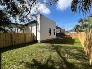 2604 E 11th Ave, Tampa, FL 33605 - view of yard featuring a fenced backyard