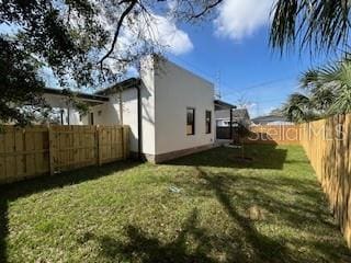2604 E 11th Ave, Tampa, FL 33605 - view of yard with a fenced backyard