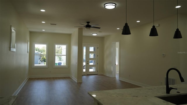 2604 E 11th Ave, Tampa, FL 33605 - kitchen featuring wood finished floors, recessed lighting, a ceiling fan, a sink, and open floor plan