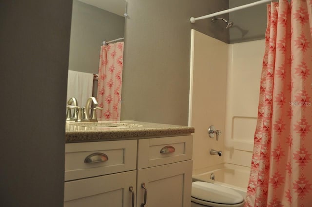 full bathroom with toilet, sink, and shower / tub combo