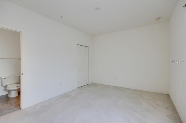 empty room with light carpet