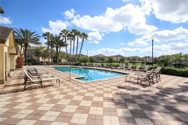 community pool with a patio