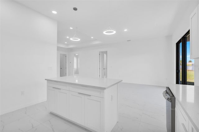 3924 NW 38th St, Cape Coral, FL 33993 - kitchen featuring light marble finish flooring, stainless steel dishwasher, white cabinetry, recessed lighting, and light countertops