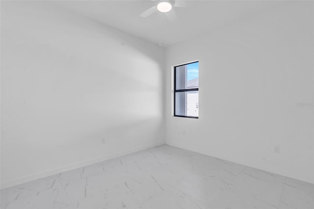 3924 NW 38th St, Cape Coral, FL 33993 - unfurnished room with marble look tile flooring and ceiling fan