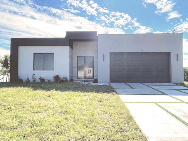 3924 NW 38th St, Cape Coral, FL 33993 - contemporary home with concrete driveway, stucco siding, a garage, and a front lawn