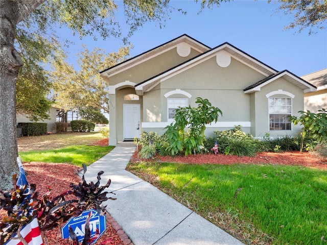 view of front facade with a front lawn