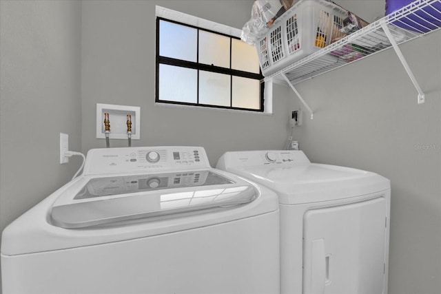 laundry area featuring independent washer and dryer