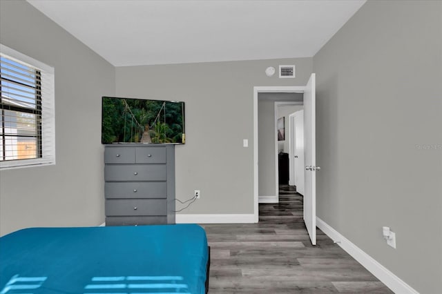 bedroom featuring hardwood / wood-style flooring