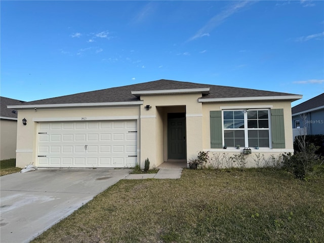 view of front facade featuring a garage and a front yard