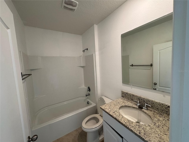 full bathroom with a textured ceiling, toilet, bathing tub / shower combination, and vanity