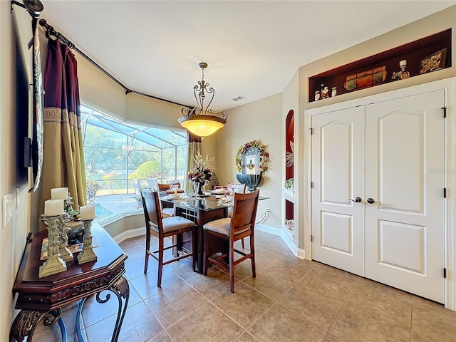 view of tiled dining space