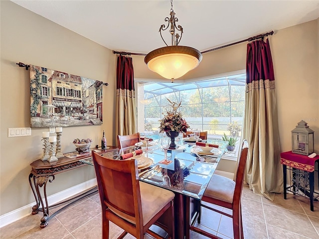 dining area with light tile patterned floors