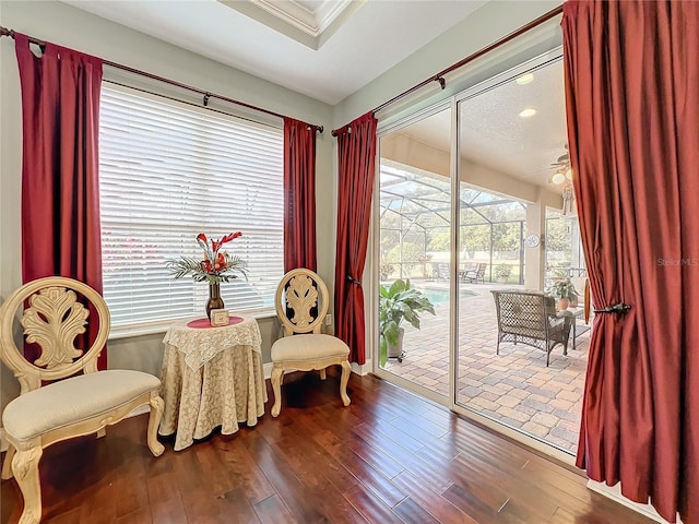 sitting room featuring hardwood / wood-style flooring and ceiling fan