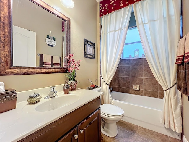 full bathroom with vanity, toilet, tile patterned floors, and shower / bath combo with shower curtain