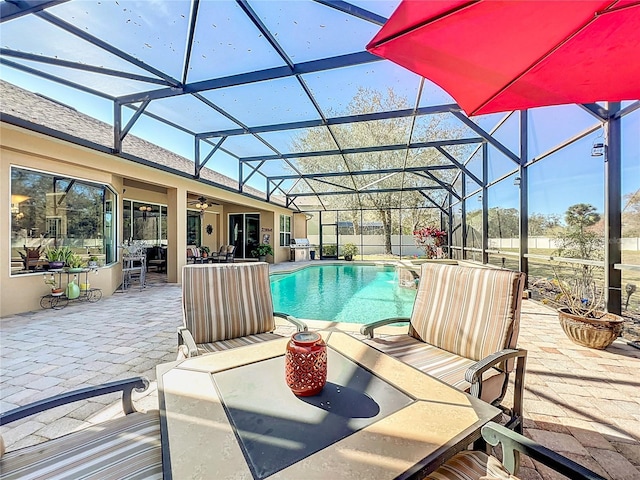 view of pool featuring a patio area and a lanai