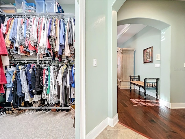 walk in closet featuring hardwood / wood-style floors