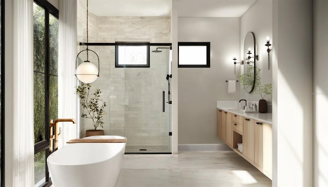 bathroom with vanity, baseboards, a freestanding tub, a stall shower, and marble finish floor