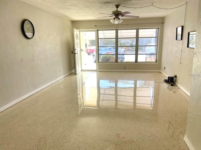 empty room with ceiling fan