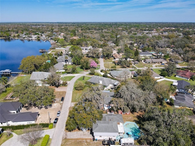 bird's eye view with a water view and a residential view