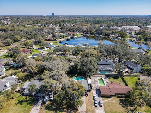 birds eye view of property featuring a residential view and a water view